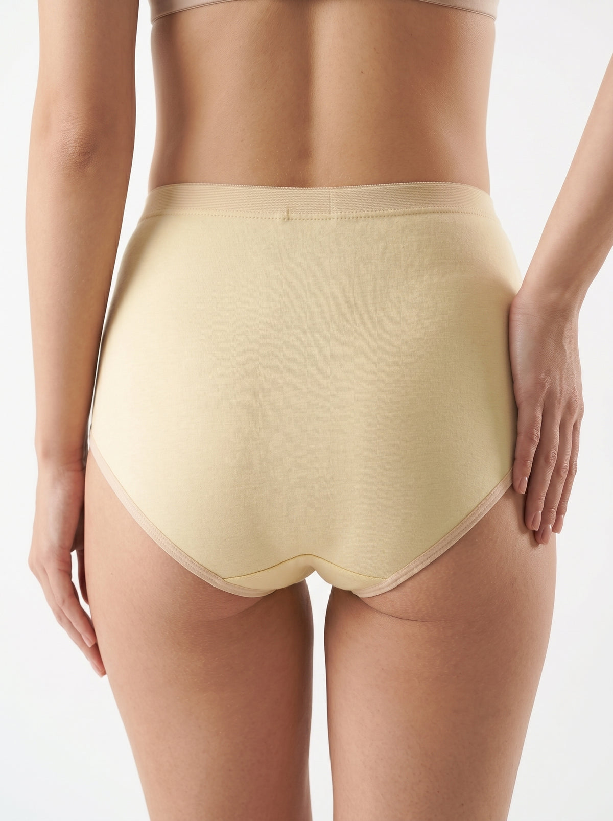 High-Waist Full Coverage Panty  High-waist design with full coverage for comfortable, all-day support.  Features a wide elastic waistband and smooth fabric for a no-visible-lines fit under any outfit.