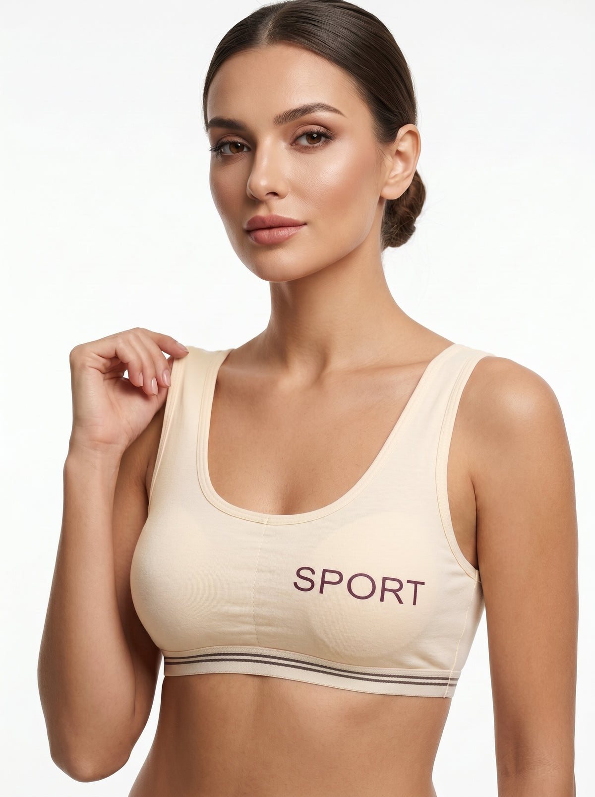 Non-wired sports bra with full coverage and wide straps for comfortable daily support.  Features a "SPORT" print on front and elastic underband for a secure, easy pullover fit.