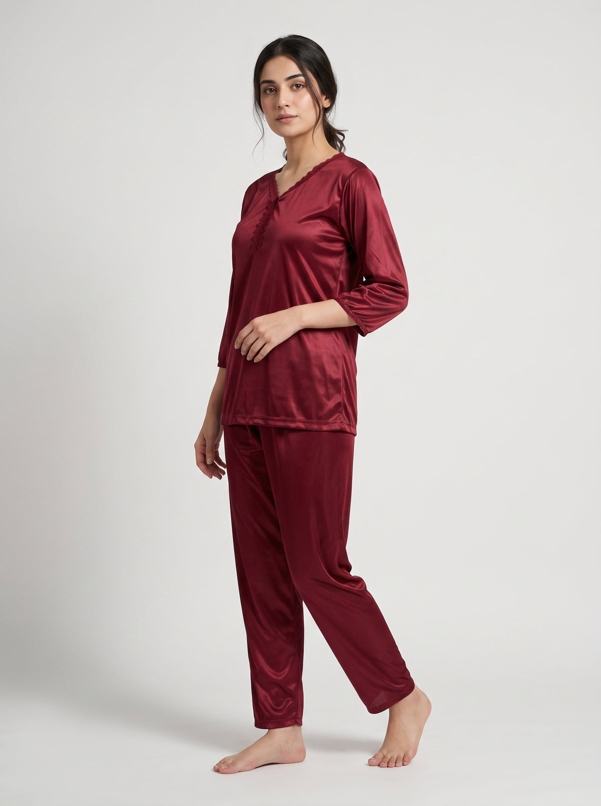 Elevate your nighttime wardrobe with this elegant maroon satin night suit, designed for comfort with a sophisticated touch