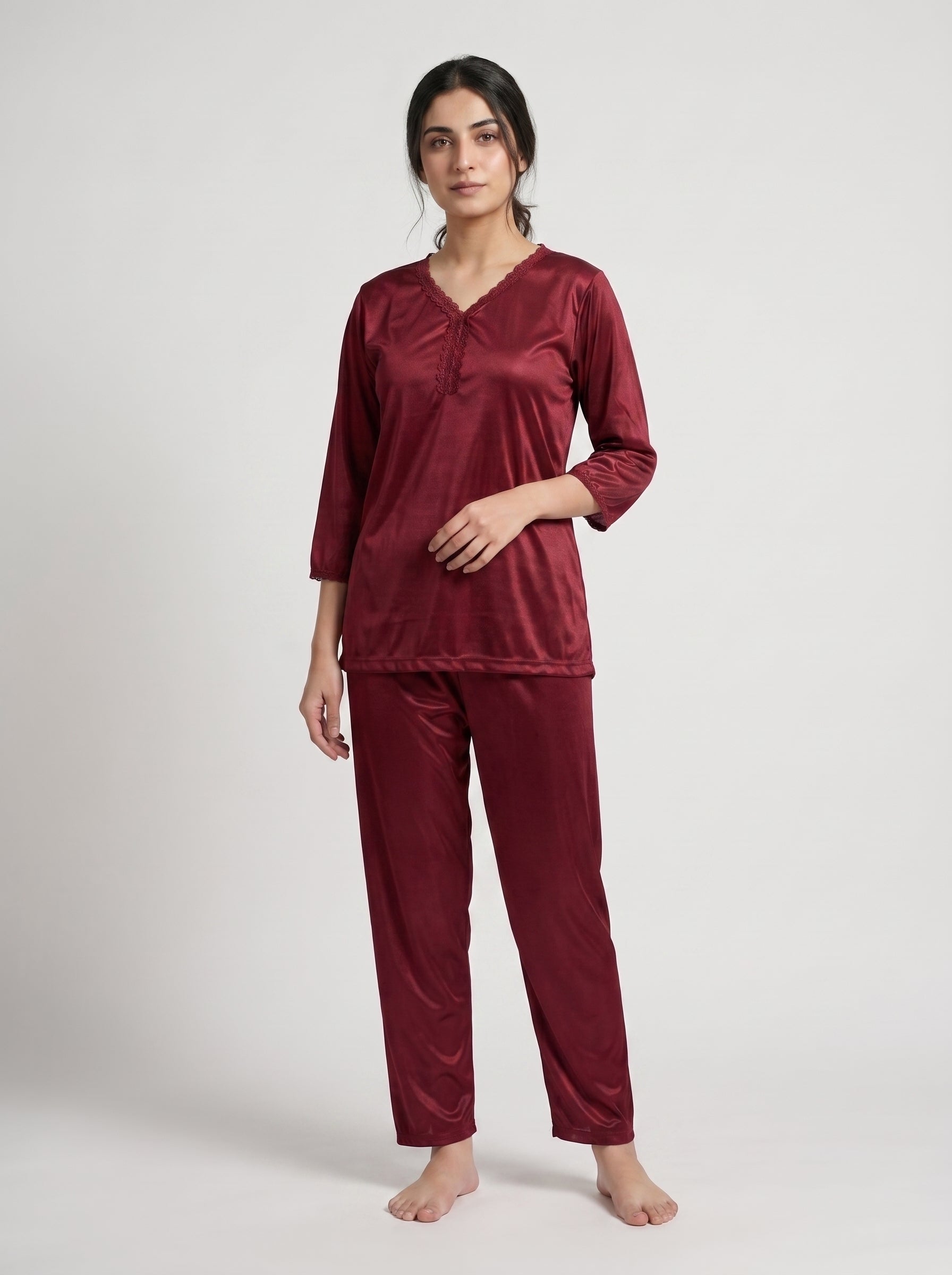 Elevate your nighttime wardrobe with this elegant maroon satin night suit, designed for comfort with a sophisticated touch