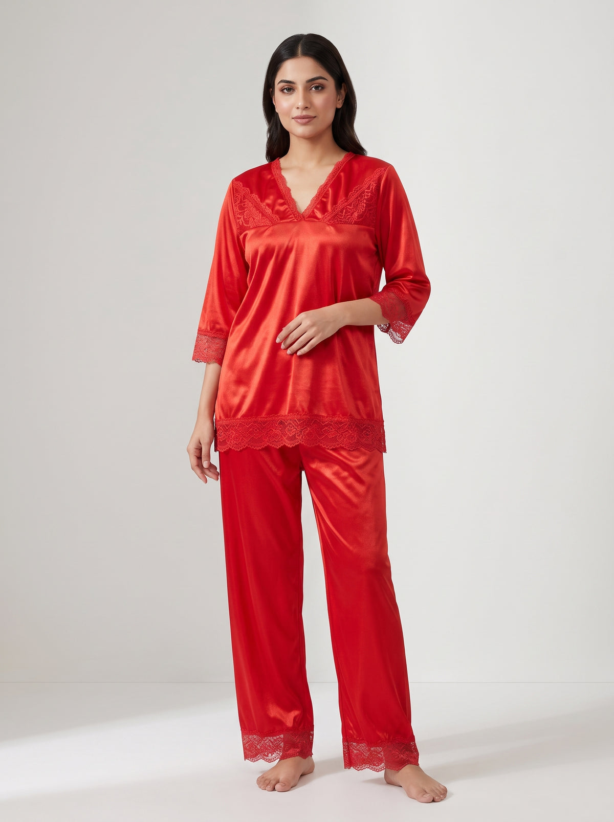 Experience effortless comfort and timeless elegance with this classic black satin pajama set