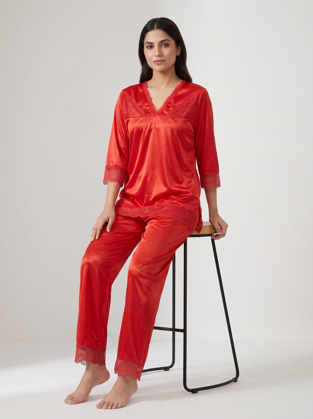 Experience effortless comfort and timeless elegance with this classic black satin pajama set