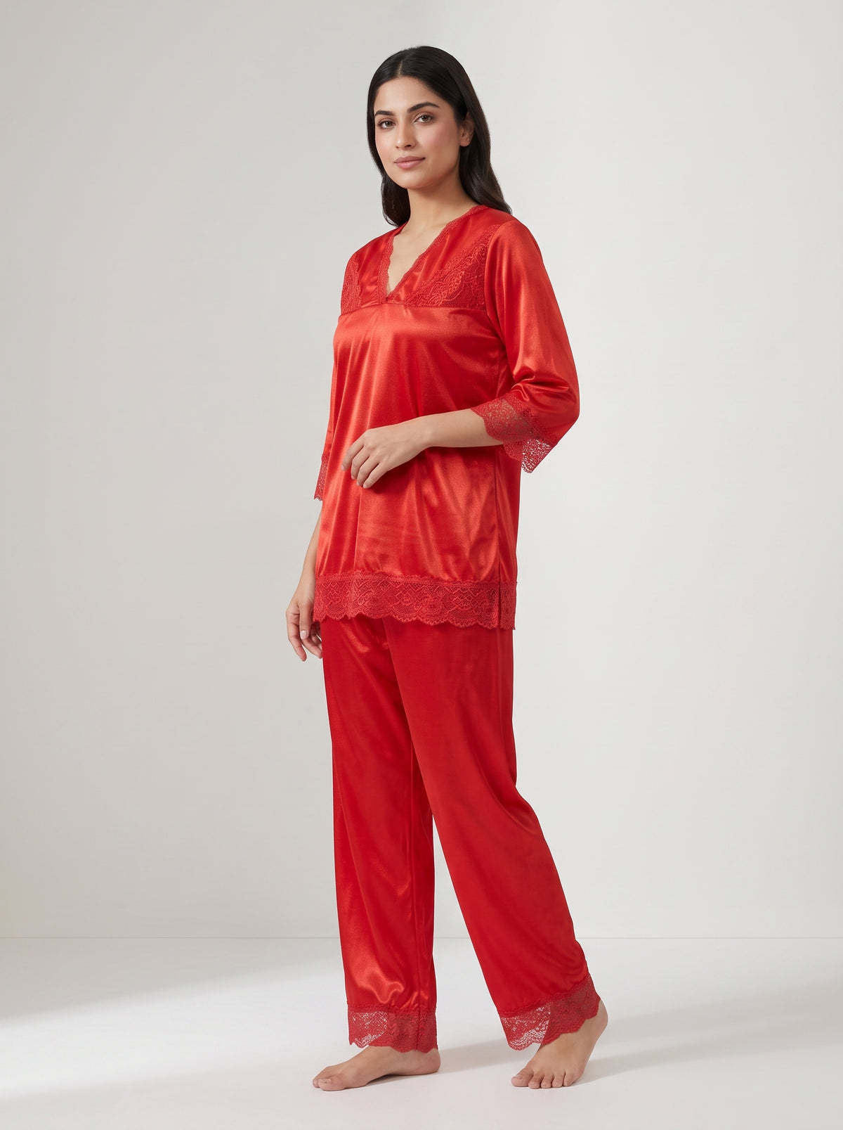 Experience effortless comfort and timeless elegance with this classic black satin pajama set