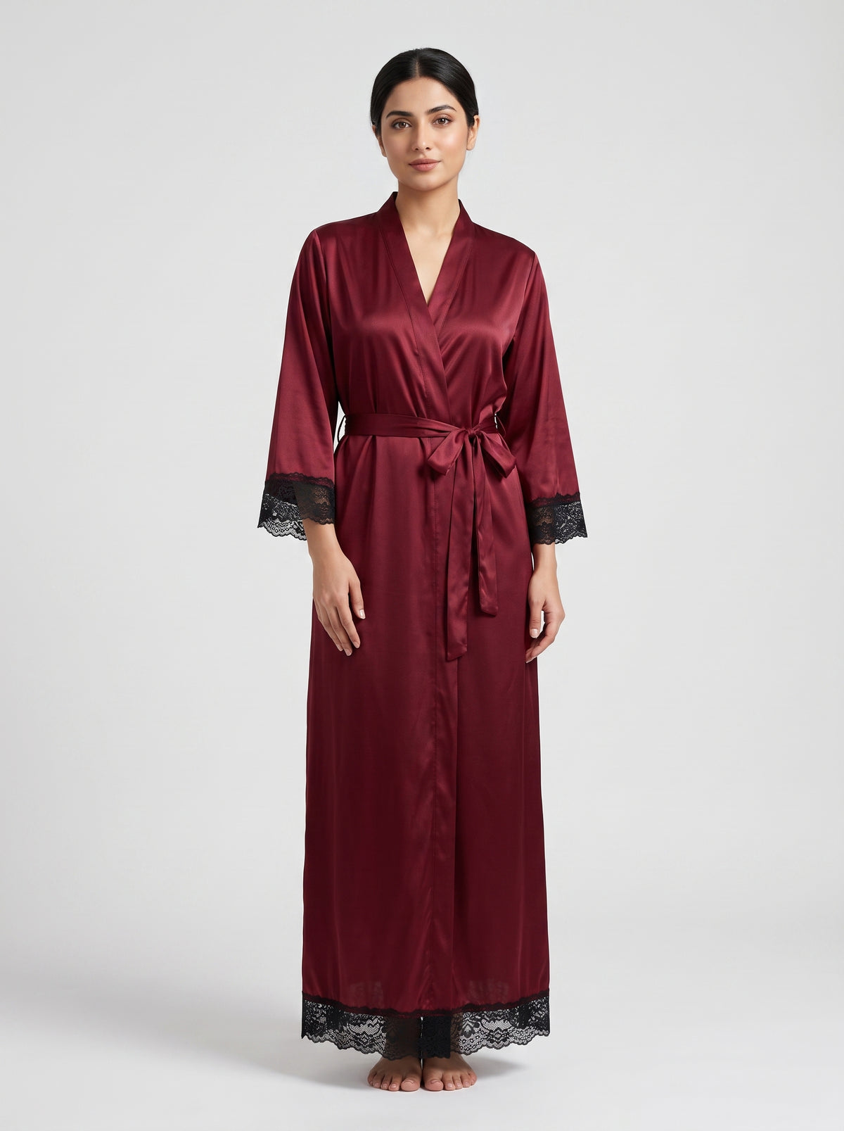 Indulge in elegant comfort with this sophisticated satin long robe, designed with a graceful wrap-front silhouette and delicate lace accents.