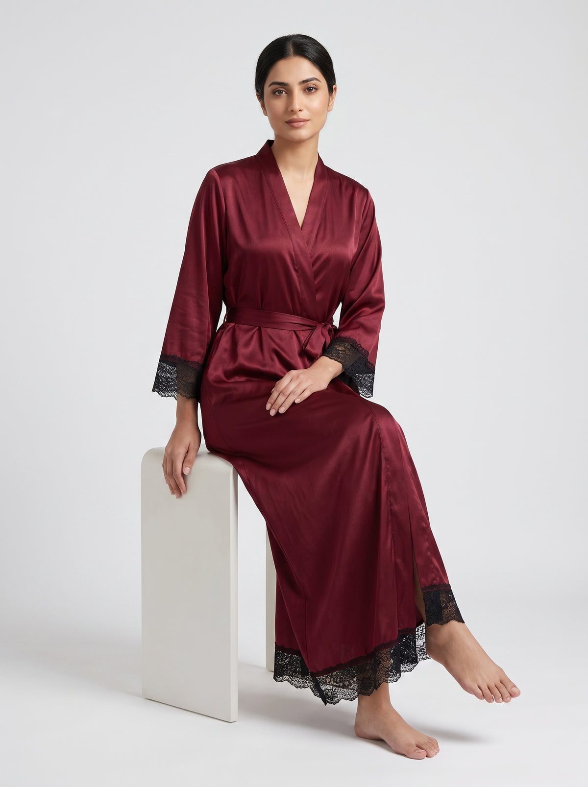 Indulge in elegant comfort with this sophisticated satin long robe, designed with a graceful wrap-front silhouette and delicate lace accents.